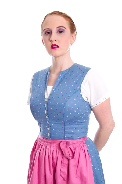 Strikt kvinna i dirndl Stockbild