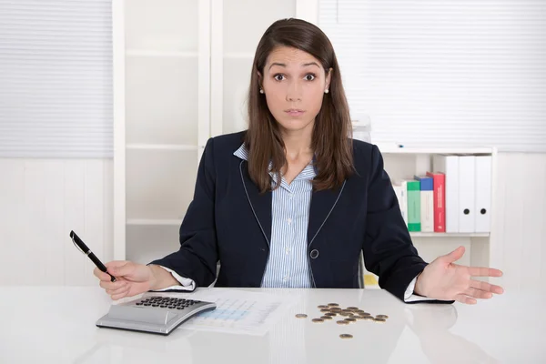 Frustrated businesswoman with euro coins in the office - empty c — Stock Photo, Image