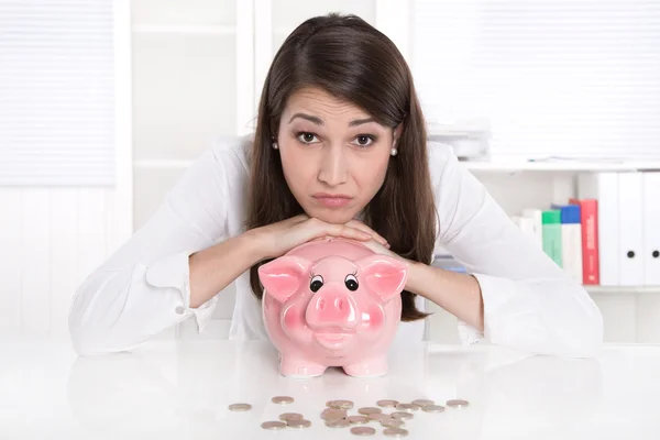 Pretty caucasian business woman in depression because of her sav Stock Photo