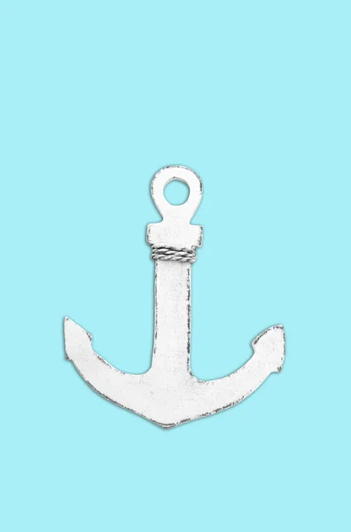 Isolated anchor: maritime decoration of wood on a turquoise back — Stock Photo, Image