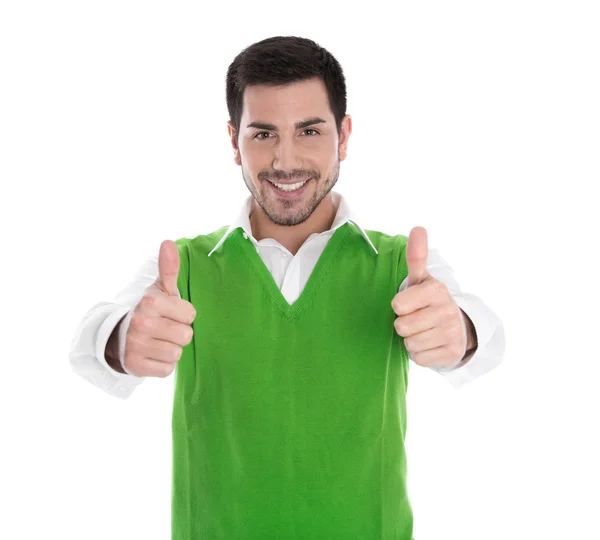 Glad ung man isolerat i en grön skjorta och tummen upp. — Stockfoto