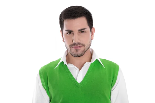 Aantrekkelijke jonge man in een groen shirt geïsoleerd op wit Stockfoto