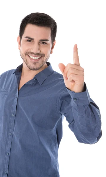 Isolierter Mann in Weiß mit blauem Hemd, der mit dem Zeigefinger zeigt — Stockfoto
