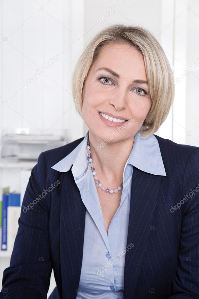 Face of a successful mature business woman in the office.