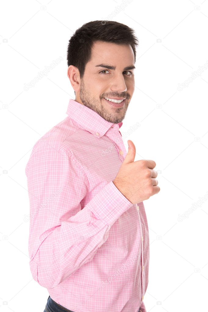 Successful businessman in pink shirt with thumb up.