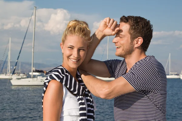 Portrait of attractive young couple in love on sailing boat. — Stock Photo, Image