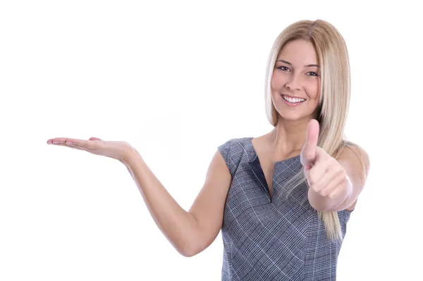 Isolated blond smiling businesswoman is presenting and thumb up. Stock Image