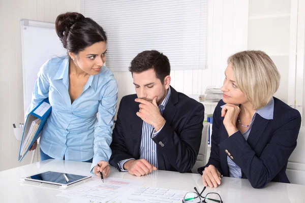 Business meeting at office with three business people. — Stock Photo, Image