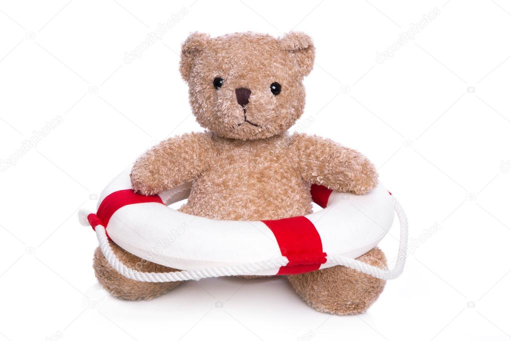 Isolated teddy bear - concept for children swimming course.
