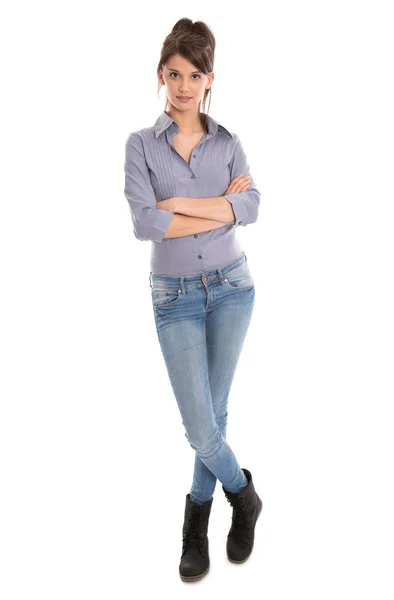 孤立的年轻女子，在蓝色的牛仔裤和全身长度. 免版税图库图片
