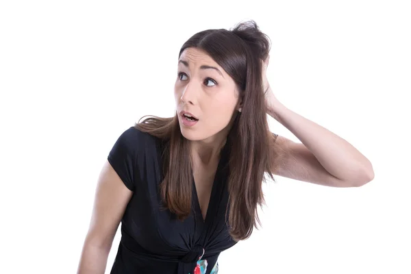 Amazed and dumbfounded young woman looking sideways. Stock Image