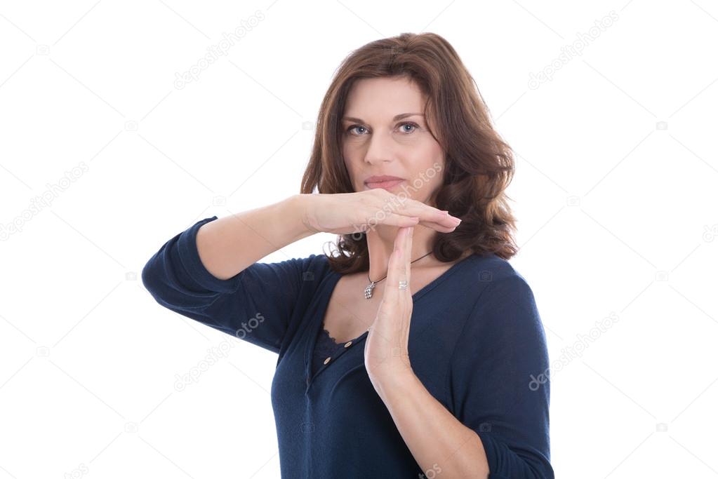 Older woman showing break with her hands isolated on white.