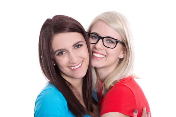 Isolated portrait of two happy smiling girlfriends on white. — Stock Photo, Image