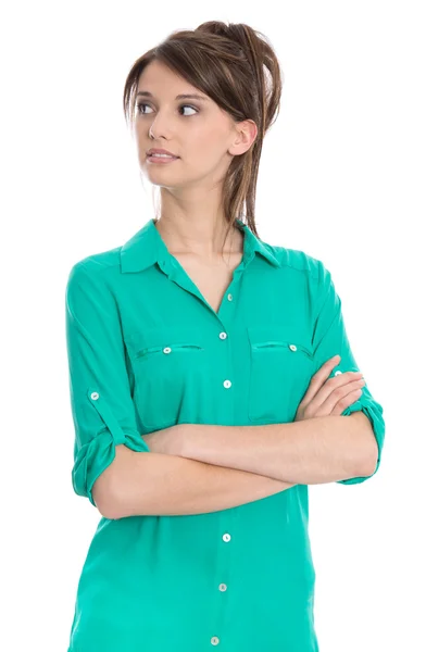 Isolierte Studentin in Bluse, die mit verschränkten Armen zur Seite schaut. — Stockfoto