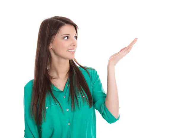 Isolated brunette trainee is presenting on white background. Stock Image