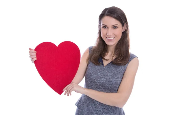 Joven mujer sonriente sosteniendo un gran corazón rojo . — Foto de Stock