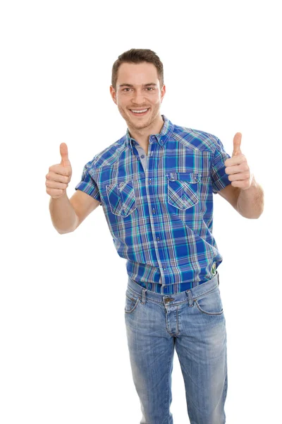 Vereinzelt glücklicher junger Mann in Blau mit erhobenem Daumen. — Stockfoto