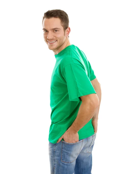 Gelukkig jonge man in groen shirt geïsoleerd op wit. — Stockfoto