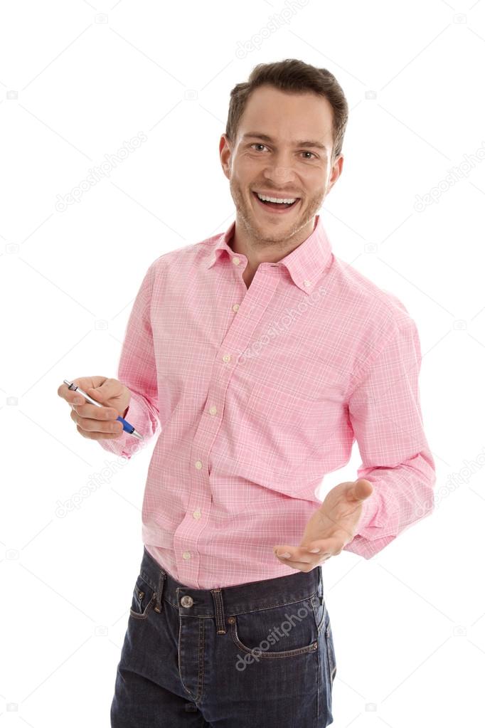 Isolated successful attractive young man in pink with open hand