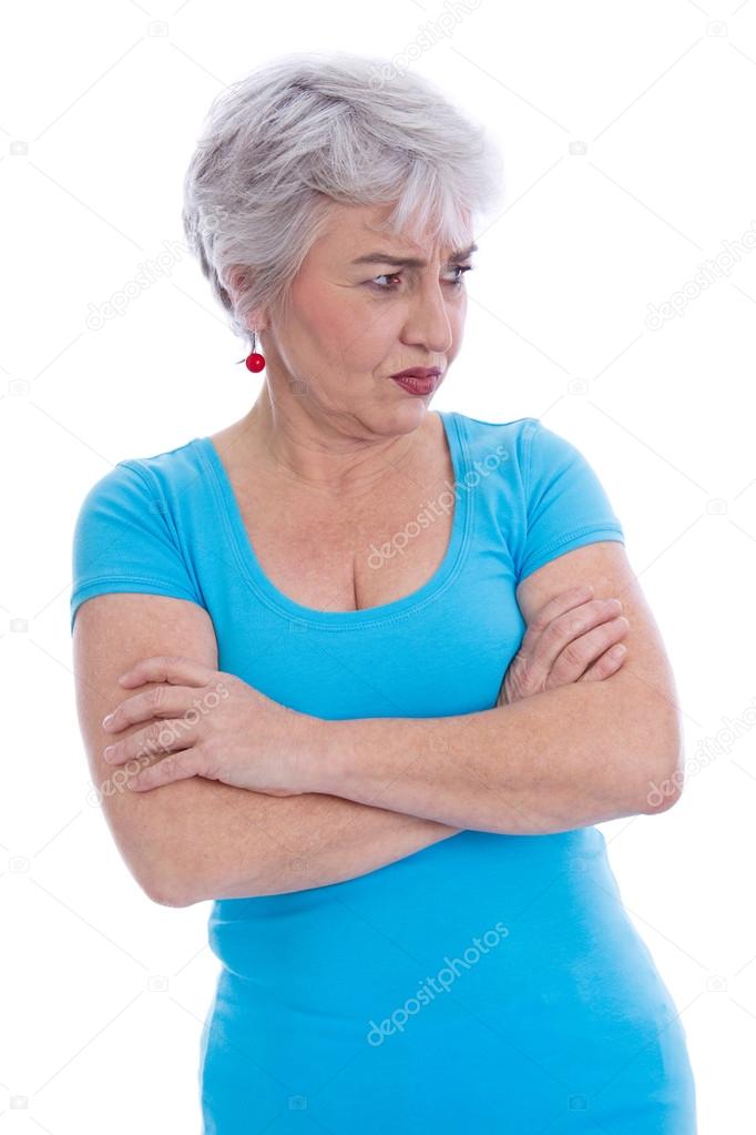 Thoughtful view: isolated elderly woman in a turquoise shirt.