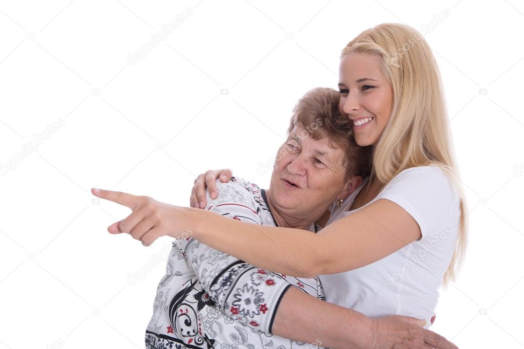 Young woman with her grandmother presenting.