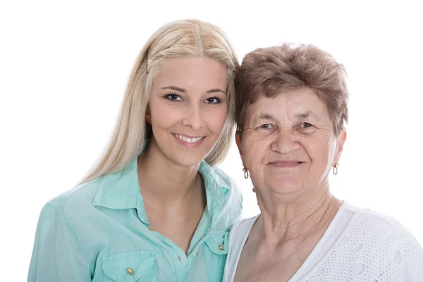 Isoliertes Porträt der echten Großmutter mit ihrer Enkelin. — Stockfoto