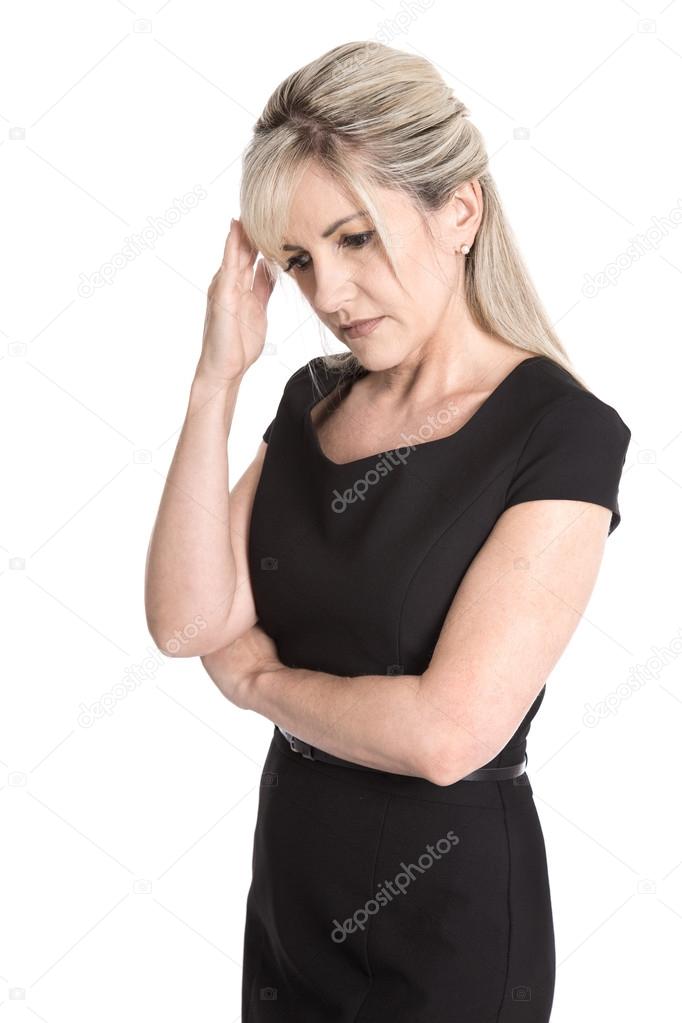 Sad and sorrowful isolated woman in black dress isolated over wh