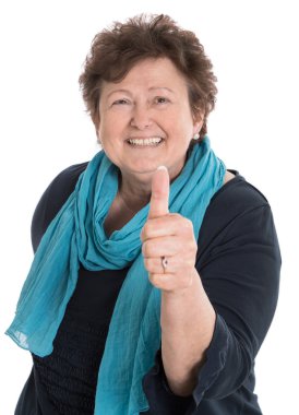 Isolated happy older woman with thumb up clipart