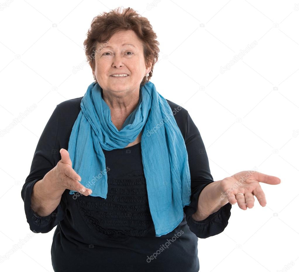Portrait of a happy isolated female senior talking with her hand
