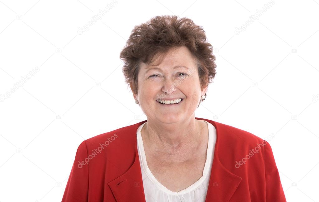 Happy isolated senior woman face with wrinkles and red jacket.