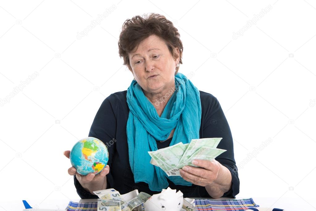 Portrait: Pensive older lady thinking about holidays - money con