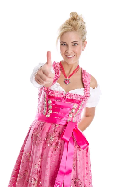 Gelukkig jonge blonde vrouw in dirndl jurk in Beierse folkart. — Stockfoto