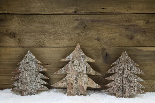 Árboles de Navidad hechos a mano de madera - tarjeta de felicitación natural . — Foto de Stock