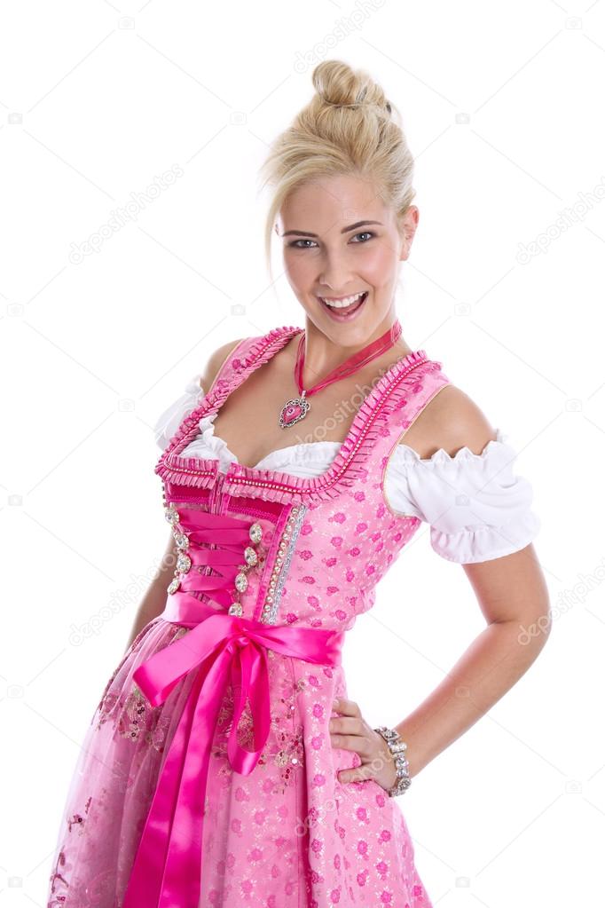 Pretty isolated young woman wearing bavarian dress called dirndl