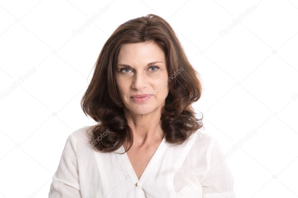 Isolated serious and doubtful older woman in middle age.