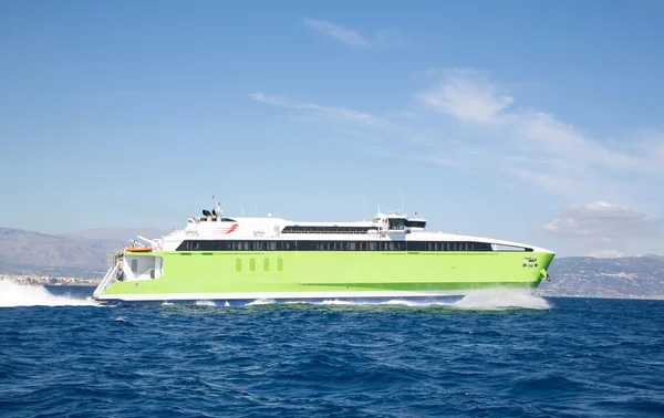 Green ferry spead boat on the greek islands. — Stock Photo, Image