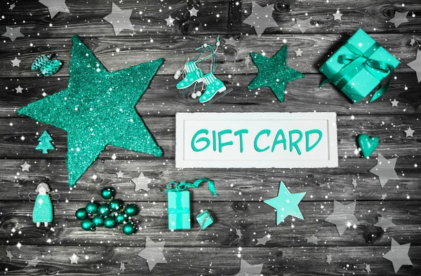 Christmas gift card for a xmas coupon decorated in mint green, w — Stock Photo, Image