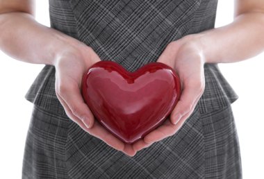 Isolated woman holding a red heart in her hands. clipart