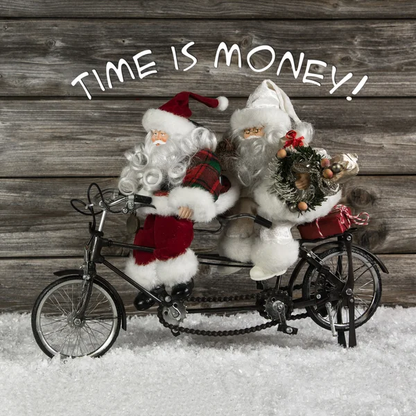 El tiempo es dinero - equipo de Santa Claus en la prisa por comprar Navidad — Foto de Stock