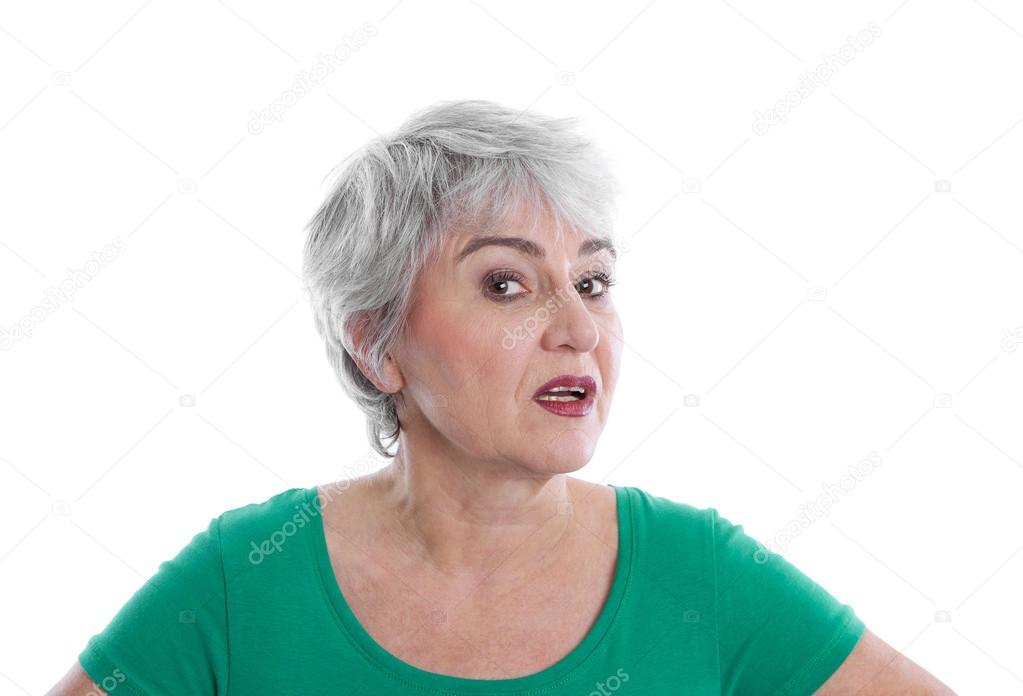 Isolated disappointed mature woman wearing green shirt looking a