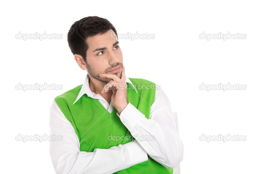 Portrait: Isolated young business man in green looking doubtful