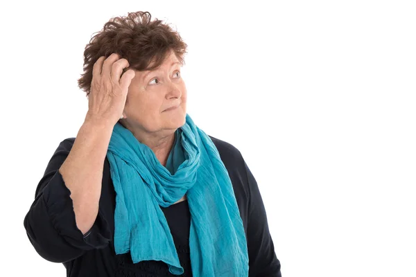 Isolerade chockad senior kvinna ser fundersam och sorgsna sida — Stockfoto