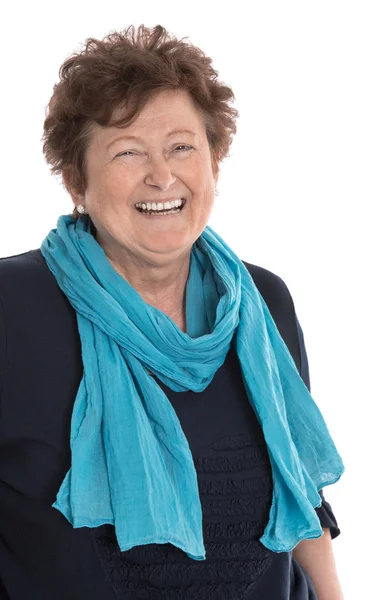 Retrato: Mujer jubilada feliz aislada vistiendo azul y turquo — Foto de Stock