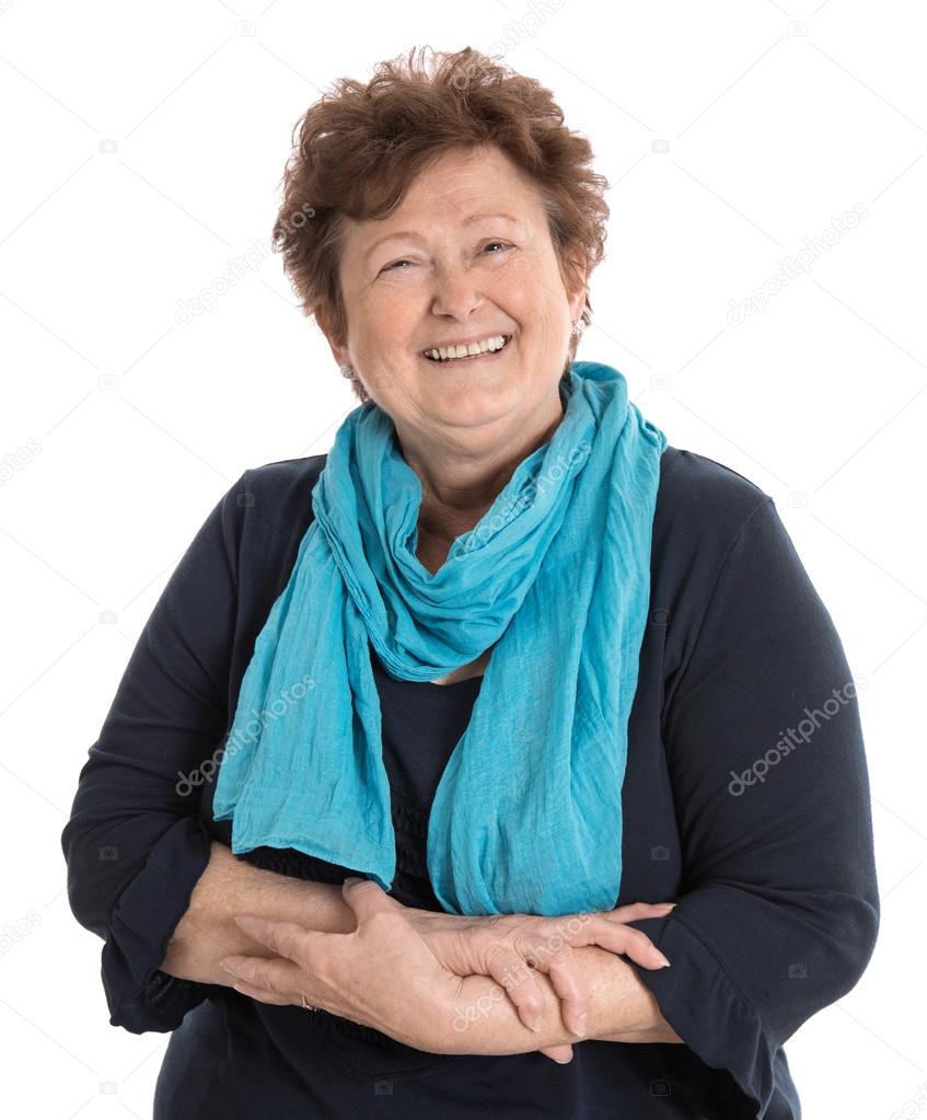 Portrait: Isolated happy pensioner woman wearing blue and turquo