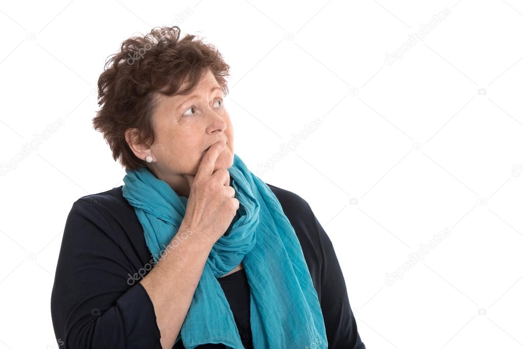 Isolated stunned senior woman looking pensive and sorrowful side