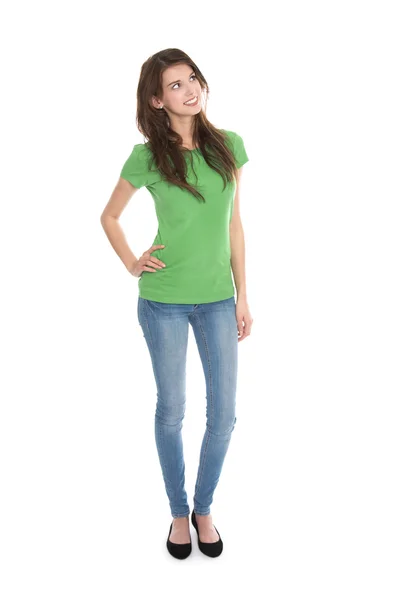 Slim young woman wearing green shirt and blue jeans in full body — Stock Photo, Image