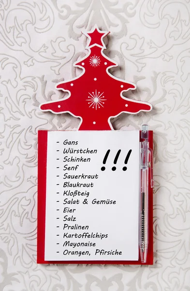 Weihnachtseinkaufsliste in deutschen Buchstaben. Weihnachtsveranstalter für Gi — Stockfoto