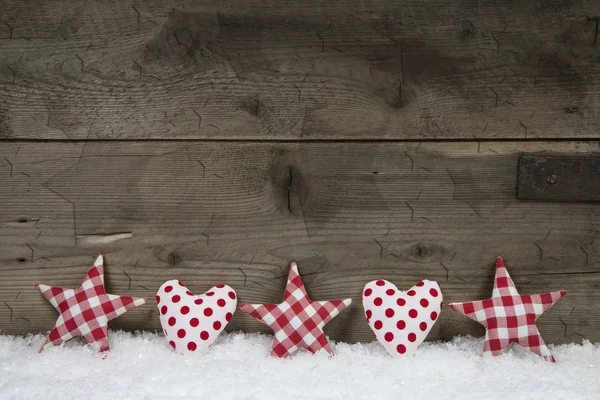 Houten Kerstmis achtergrond met rode witte gecontroleerd harten en st — Stockfoto