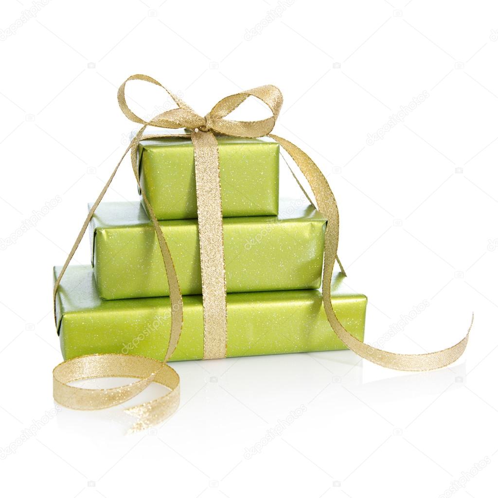 Green gift box isolated - wrapped in green paper with golden rib