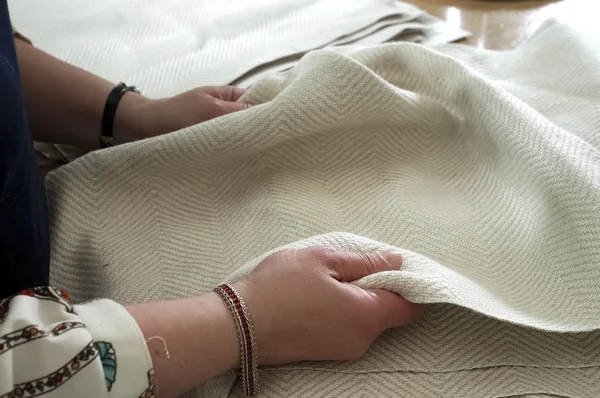 Tailor holding textile — Stock Photo, Image